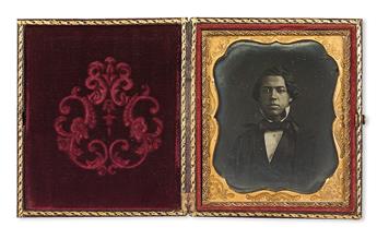 (PHOTOGRAPHY--EARLY AND CASED IMAGES.) Seated young man (supplied title).